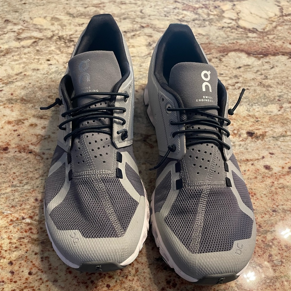 Woman’s like new ON and CloudTec running sneakers.